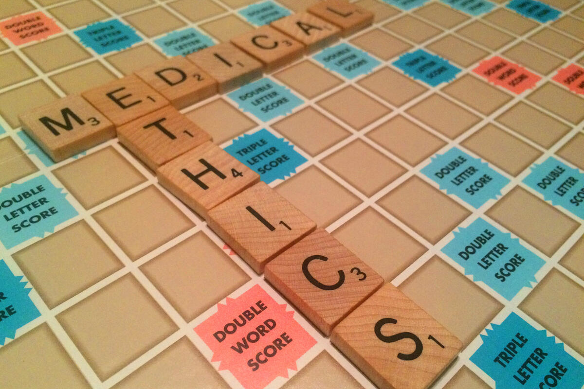 scrabble with the words medical and ethics