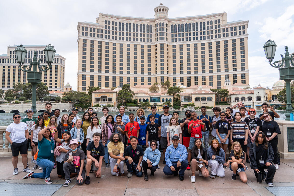 large group of young students in front of fountains of bellagio hotel