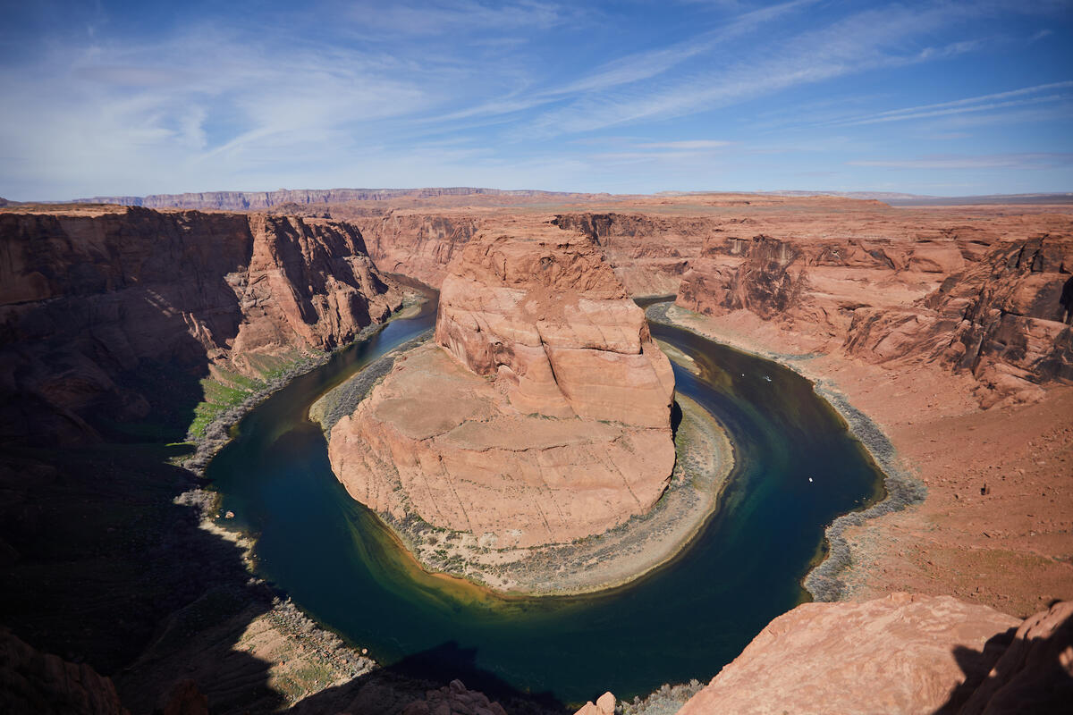 Horseshoe Bend is a horseshoe-shaped incised meander of the Colorado River located near the town of Page, Arizona, United States. It is also referred to as the &quot;east rim of the Grand Canyon.”