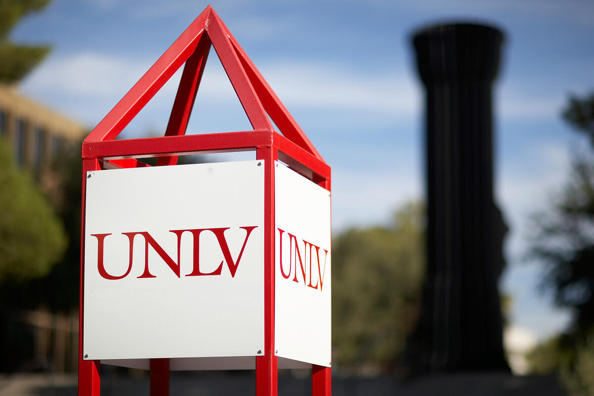 U.N.L.V. sign with the Flashlight in the background