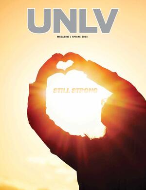 Magazine cover with image of woman making heart hands. Headline reads &quot;UNLV Strong&quot;