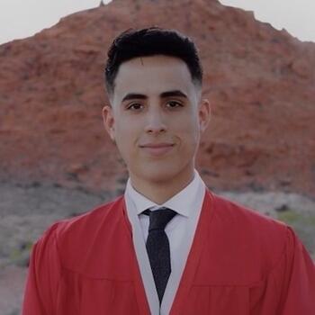 Abe Lugo poses for a graduation photo.