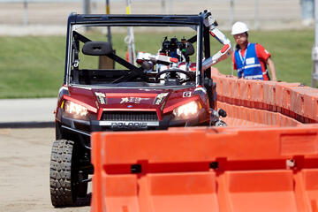 The first task of the DARPA Robotics Challenge is the driving test, which Metal Rebel expertly accomplished.