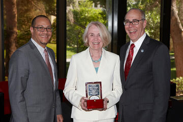 Provost John Valery White; outgoing and founding dean, School of Community Health Sciences Mary Guinan; and President Neal Smatresk.