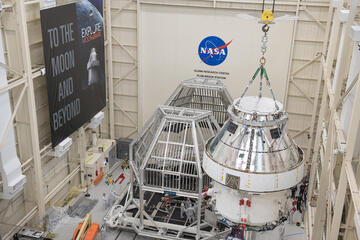 A NASA hanger holds the Orion spacecraft