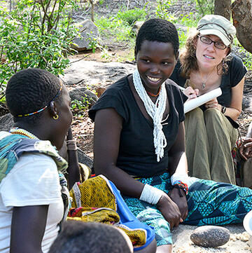 Alyssa Crittenden and two Tanzanian women