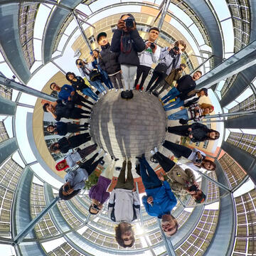 360-degree photo of a large group of students in circle
