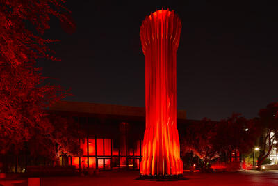 The Flashlight illuminated in red at night.