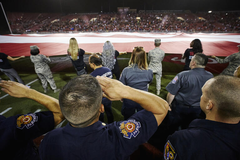 The victims of the Las Vegas mass shooting and the city's first responders were honored at UNLV's football game