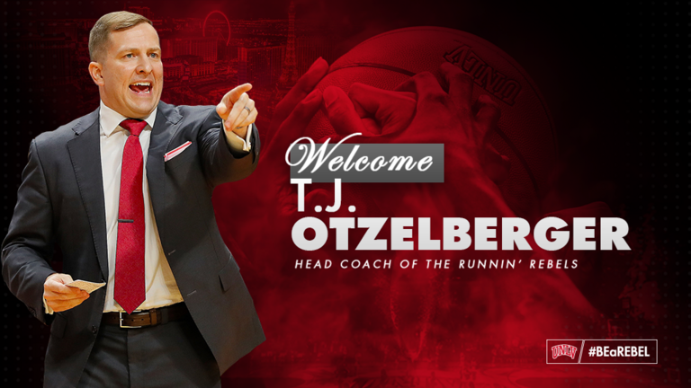 TJ Otzelberger in suit pointing to right. welcome text on graphic