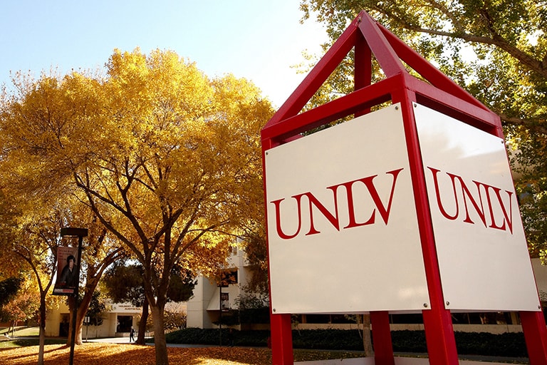 U.N.L.V. signage with Fall leaves in the background
