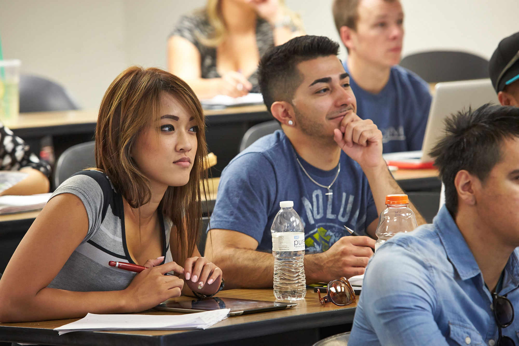 Group of students paying attention during class