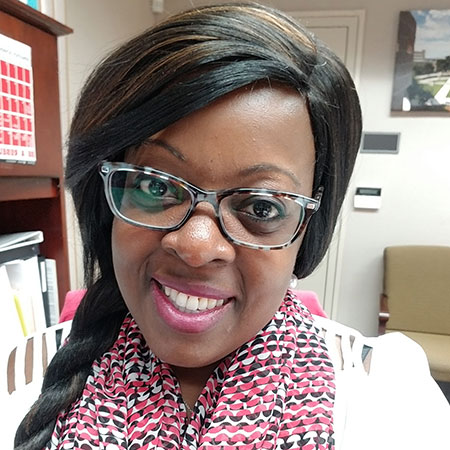 A woman with glassses.