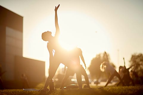 Students performing yoga