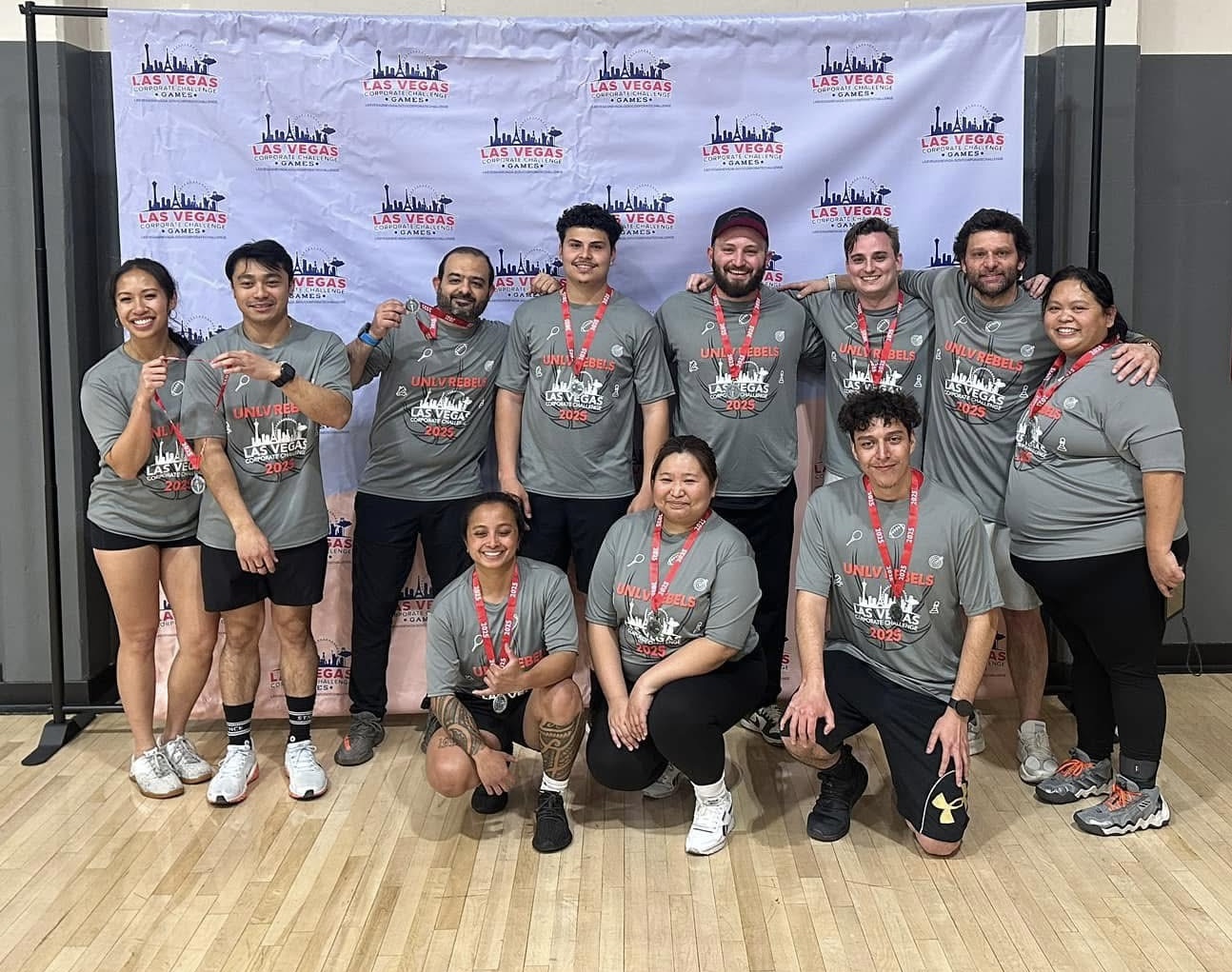 People posing for a photo in gym clothes