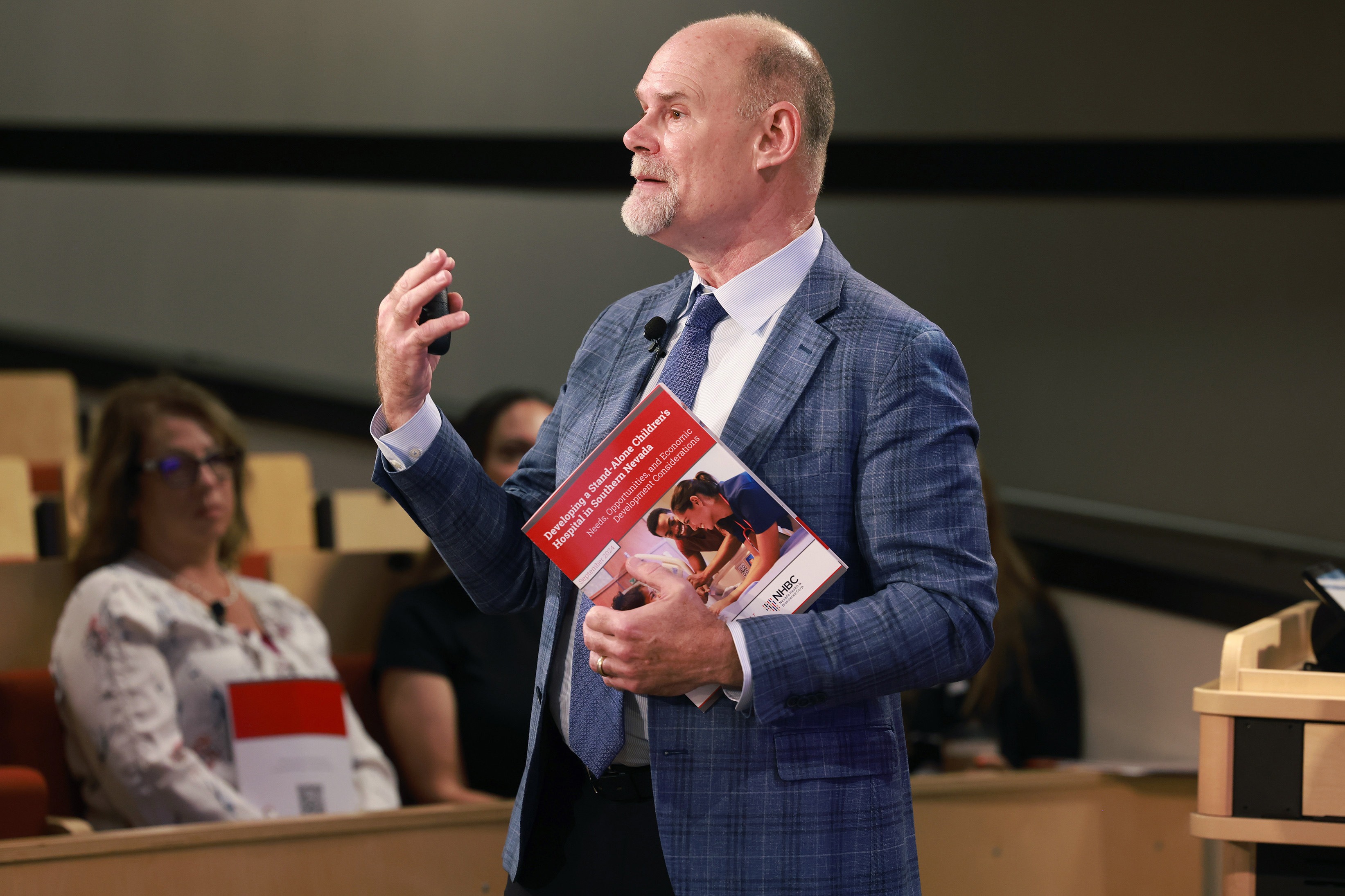 a person holding a folder