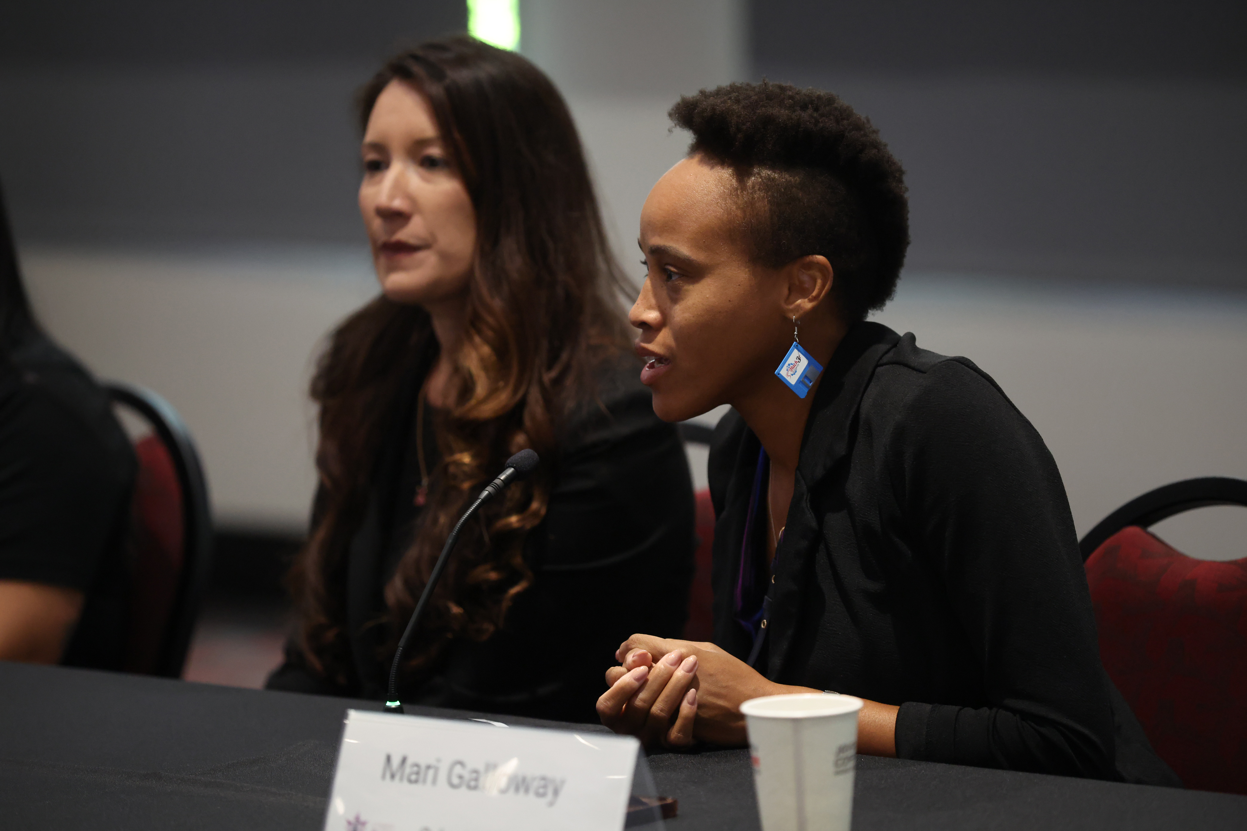 A photo of two people sitting