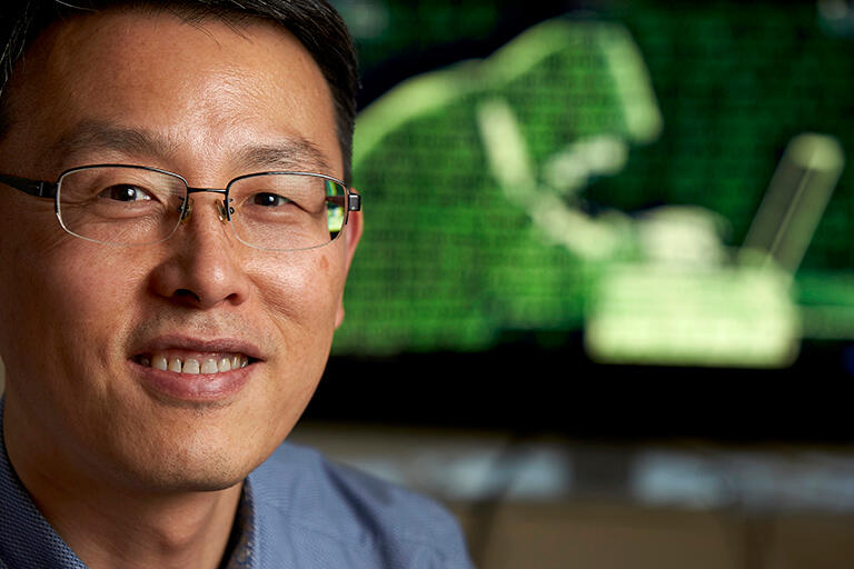 A man smirks at the camera