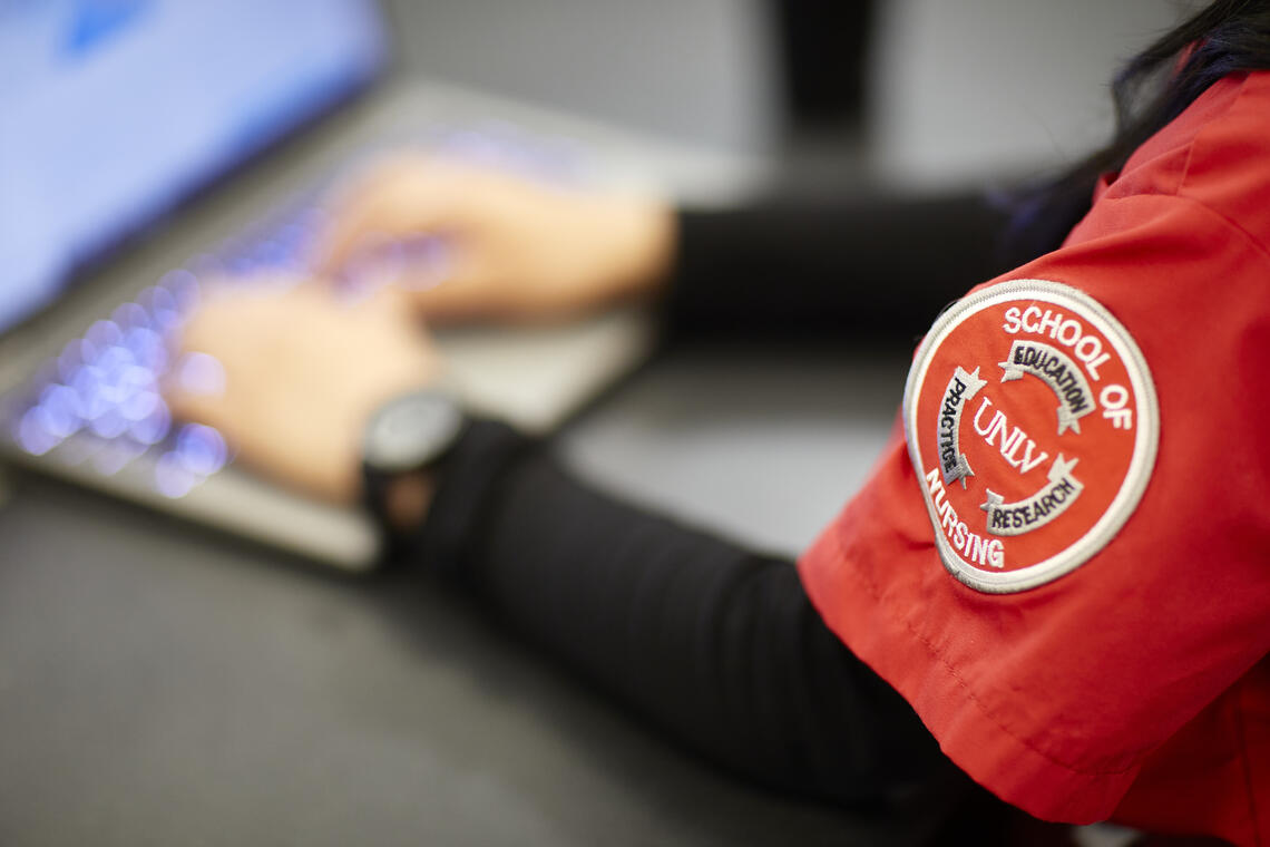 A close up shot of UNLV School of Nursing emblem on a sleeve.