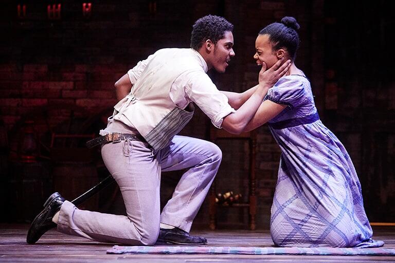 Two students perform in a play
