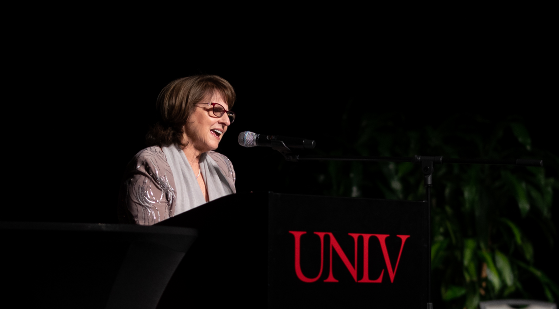 Nancy Uscher speaking at Hall of Fame at UNLV