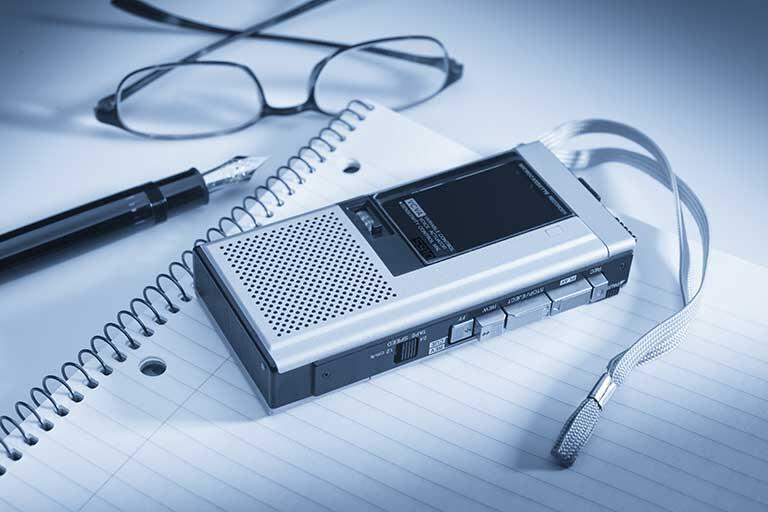 Tape recorder and notepad