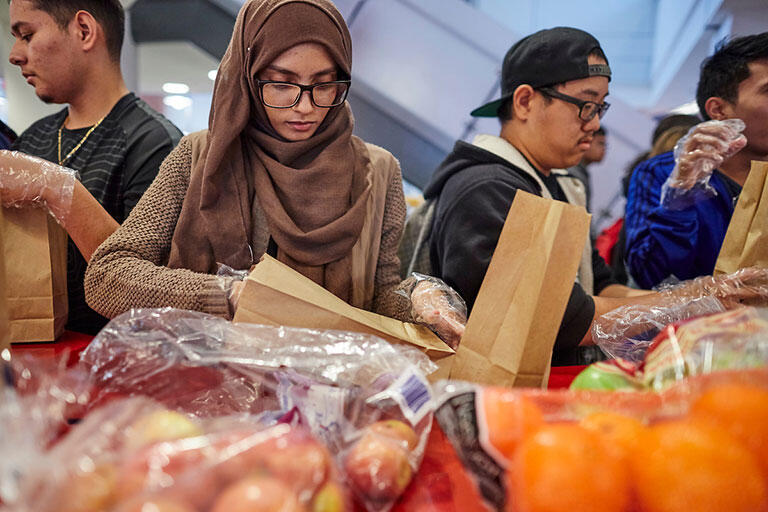 Students packing lunches