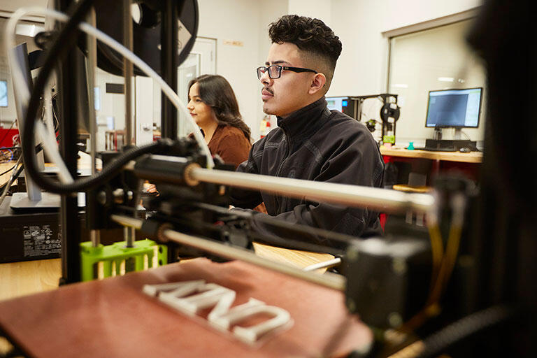Students in the Maker Space room