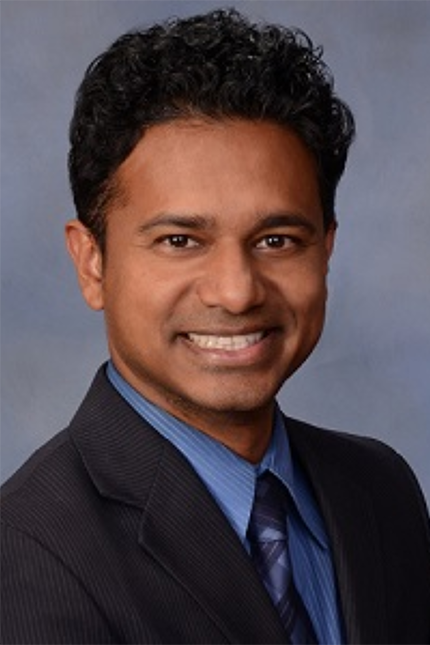 Headshot of Reeuben D'Silva