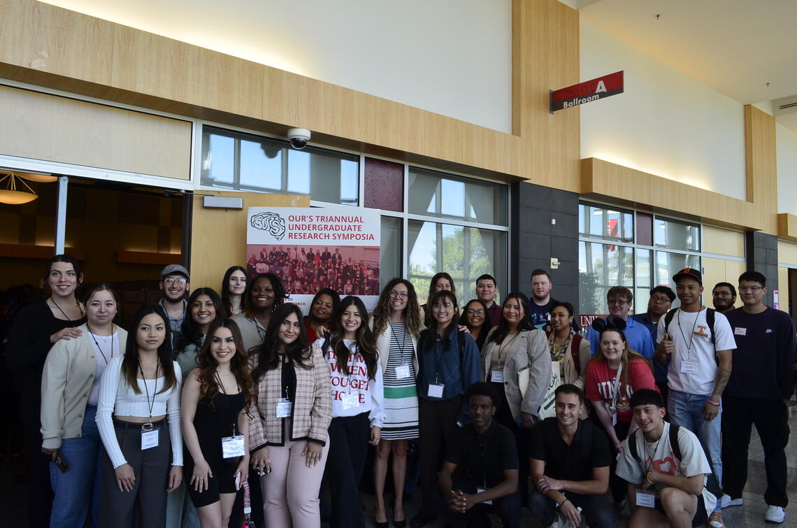 Group photo of Dr. Eda Anlamlier's students presenting at the Symposium