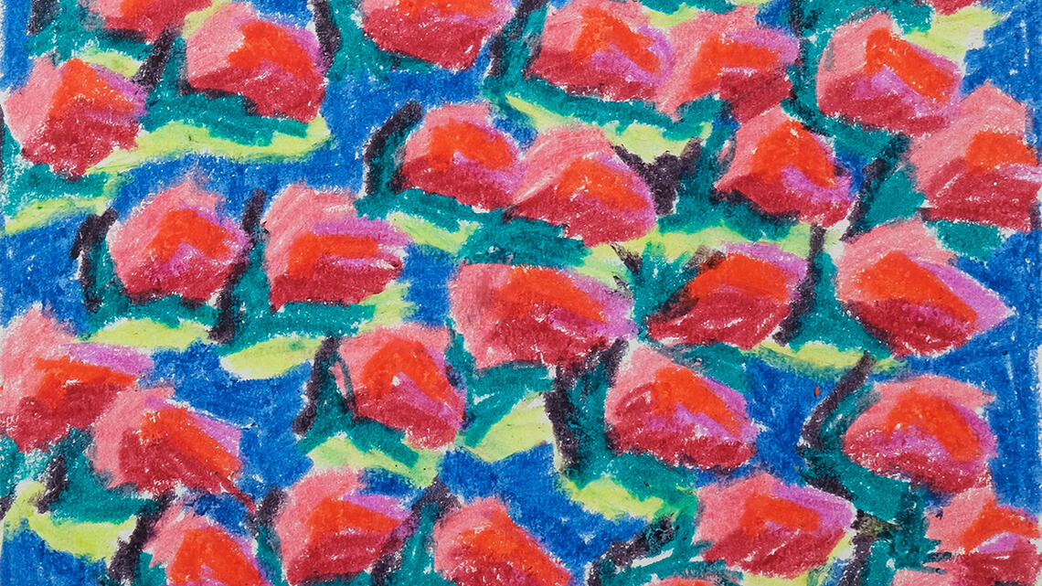 A close-up of an irregular hand drawn pattern of red and pink blobs surrounded by contrasting areas of green and blue. The drawing fills the image.