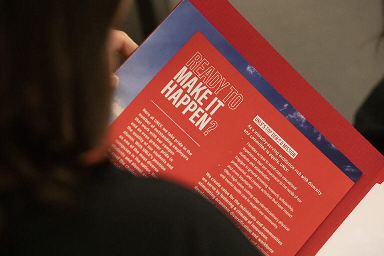 booklet that says Rebels Make it Happen