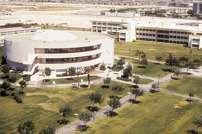 An outside view of the James R. Dickinson Library and the Carlson Education Building
