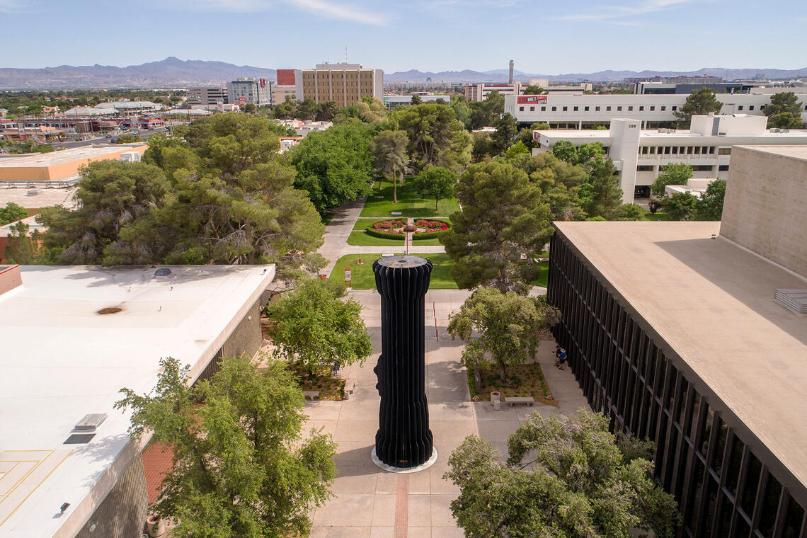 A drone image of the The Flashlight, a steel sculpture between Judy Bayley Theatre and Artemus W. Ham Concert Hall.