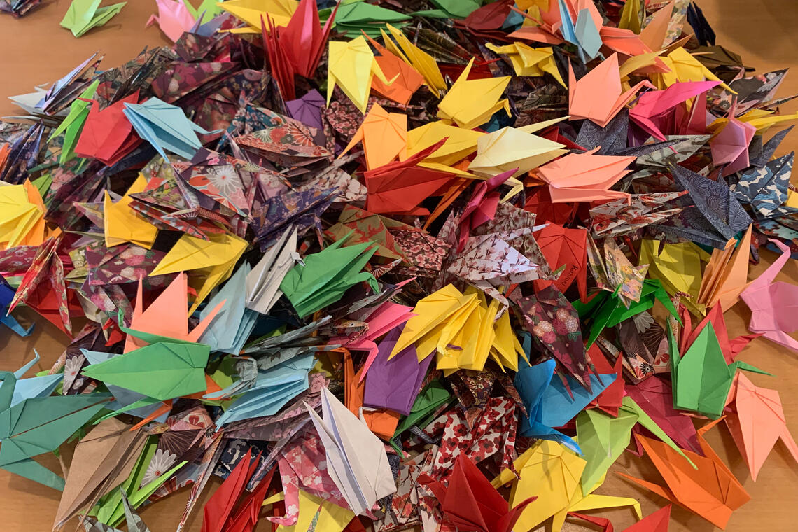 Many paper cranes folded for Cranes for UNLV