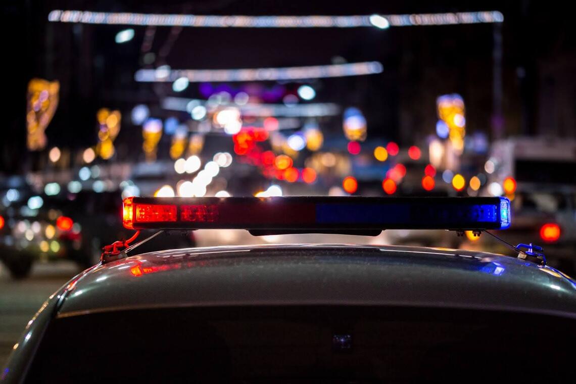 view of the top of a car with red and blue lights flashing