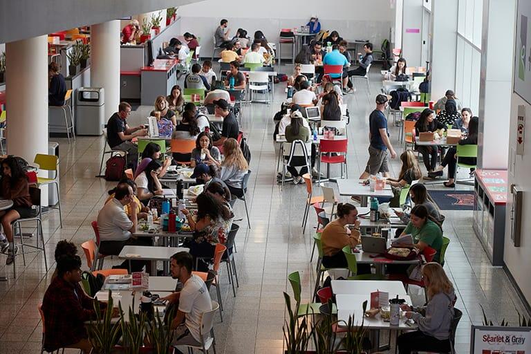Students sitting in food court
