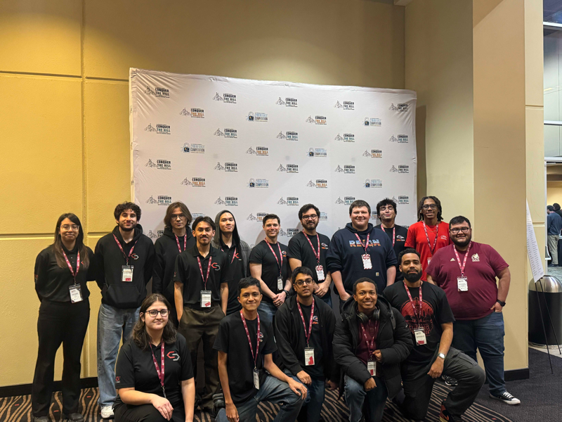 CyberForce student participants pose for a photo