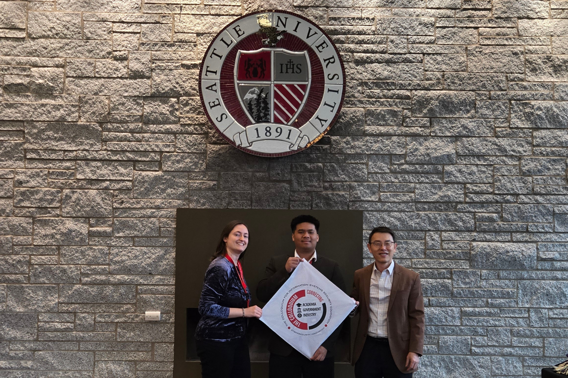 Students in front of CISSE university seal