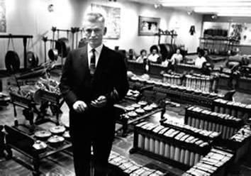 Black and white image of a professor in a band room