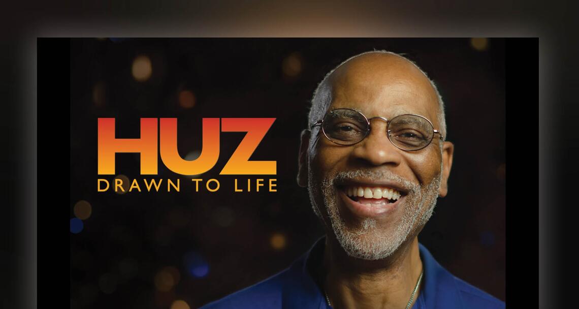 Photo of smiling man with glasses and the words: "Huz: Drawn to Life"