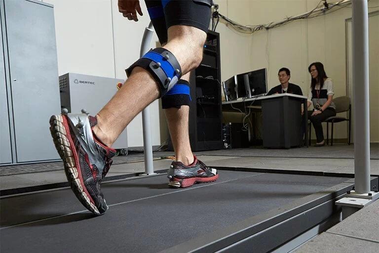A man walking on a treadmill  