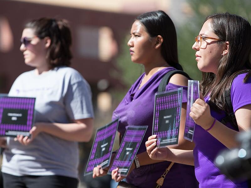 Women holding awards