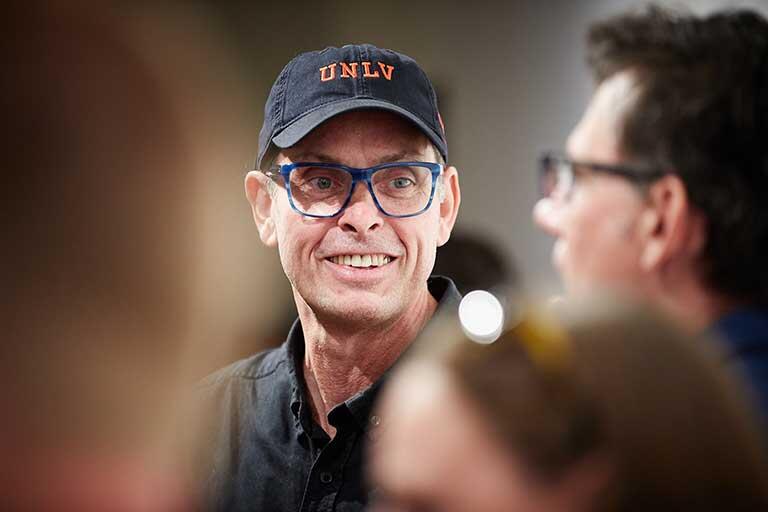 Art instructor smiles