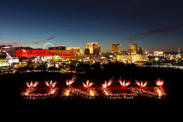 Fireworks land lights forming the letters U.N.L.V. at one of the universities largest annual traditions