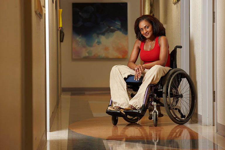 Woman smiling on a wheelchair