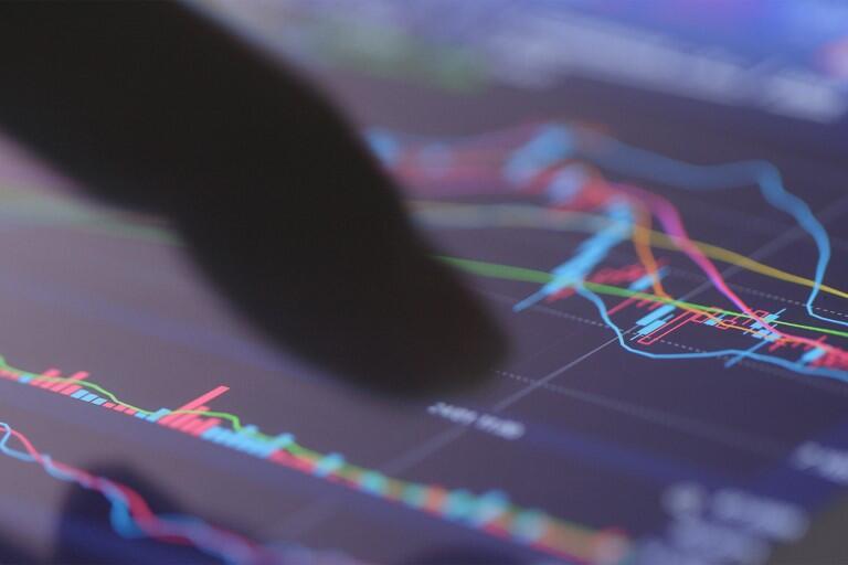Finger pointing at a diagram