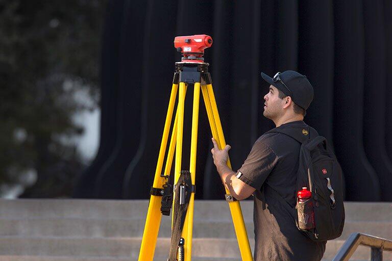 A man setting up equipment.