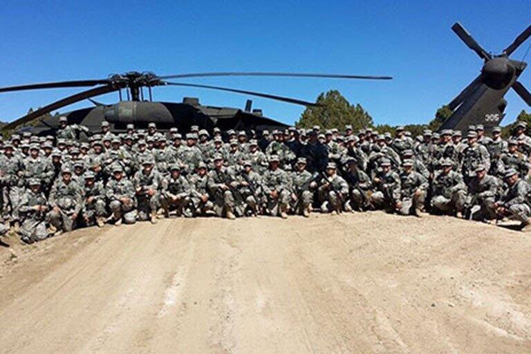 Multiple people in military uniform.
