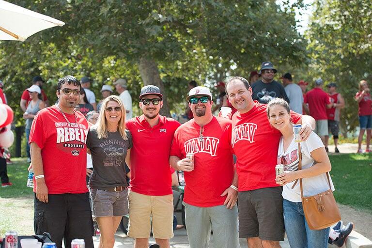 A group of alumni posing for a photo.